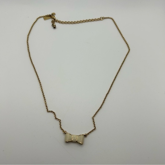 Kate Spade Gold Tone Chain with White Enamel Bow Ribbon Charm Short Necklace 19" - Picture 7 of 10